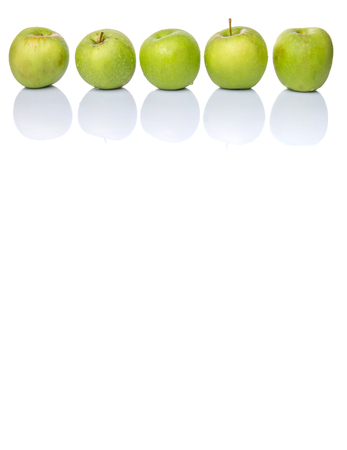 A group of green apples over white backgroundの写真素材