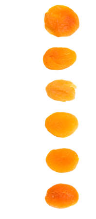 Dried apricot fruit over white backgroundの写真素材