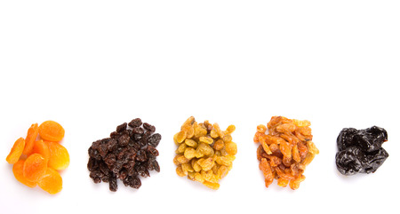 Mix dried fruit variety over white backgroundの写真素材