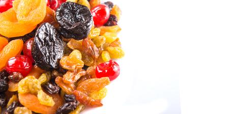 Mix variety of dried fruit over white backgroundの写真素材