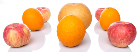 Gala apples, Nashi Asian pears and oranges over white backgroundの写真素材