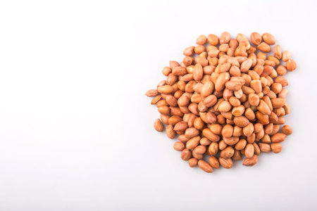 Groundnut or peanut over white background