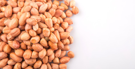 Groundnut or peanut over white backgroundの写真素材