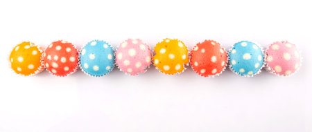 Malaysian colorful steamed rice polka dot muffin or apam polka dot on white background