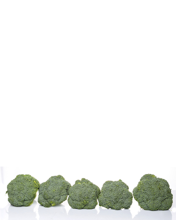 Broccoli over white backgroundの写真素材