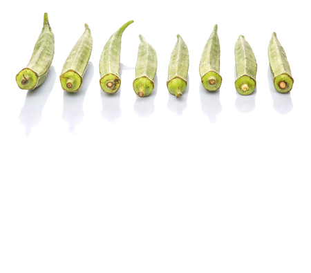 Okra or ladies fingers vegetables on white backgroundの写真素材
