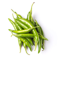 Green chili peppers over white backgroundの写真素材