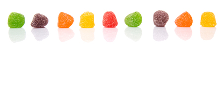 Colorful mix sugar jelly candy over white backgroundの写真素材