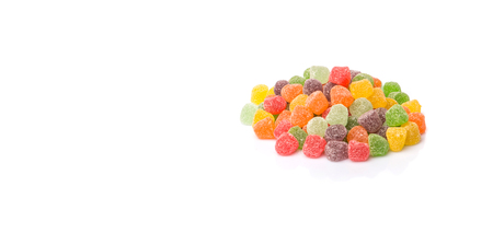 Colorful mix sugar jelly candy over white backgroundの写真素材