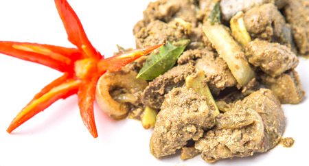 Deep fried chicken liver with carved red chili and curry powderの写真素材