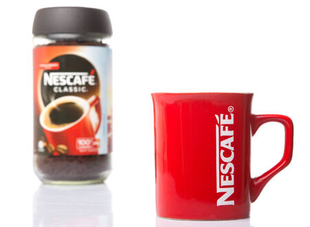 KUALA LUMPUR, MALAYSIA - JANUARY 17TH, 2015. Nescafe is a brand of instant powdered coffee made by Nestle S.A, a Swiss multinational food and beverage company, first introduced on April 1, 1938.のeditorial素材
