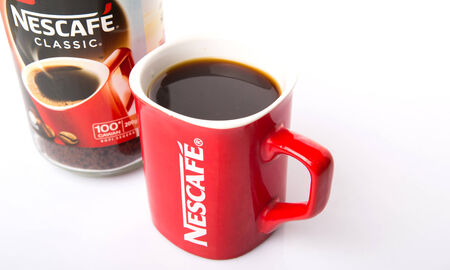 KUALA LUMPUR, MALAYSIA - JANUARY 17TH, 2015. Nescafe is a brand of instant powdered coffee made by Nestle S.A, a Swiss multinational food and beverage company, first introduced on April 1, 1938.のeditorial素材