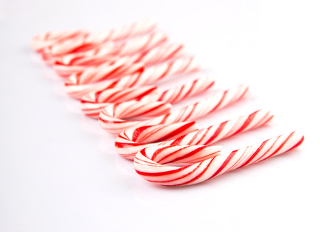 Mint Christmas colors candy cane over white backgroundの写真素材