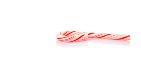 Mint Christmas colors candy cane over white backgroundの写真素材