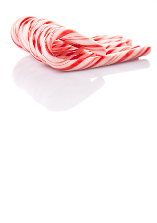 Mint Christmas colors candy cane over white backgroundの写真素材