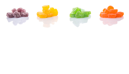 Colorful sugar jelly candy over white backgroundの写真素材