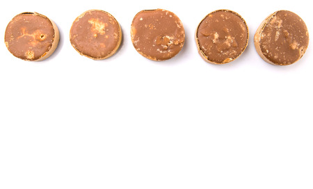 Round palm sugar over white backgroundの写真素材