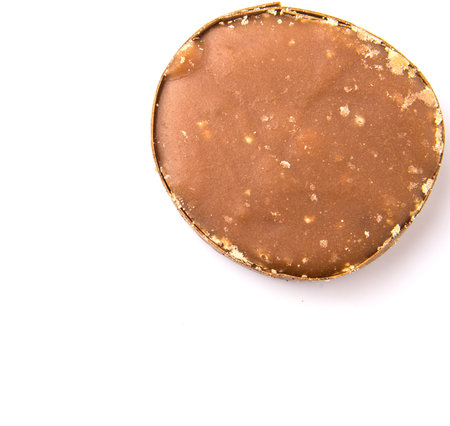 Round palm sugar over white backgroundの写真素材