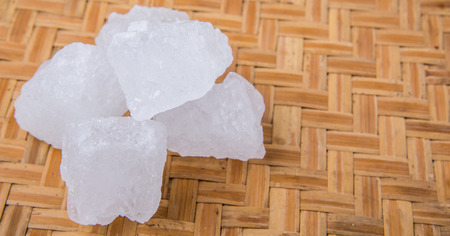 Rock sugar on wickerの写真素材