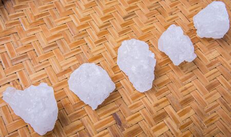 Rock sugar on wickerの写真素材