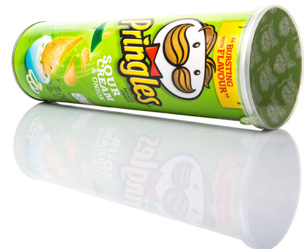 KUALA LUMPUR, MALAYSIA - JANUARY 19TH 2015. Owned by the Kellogg Company, Pringles is a brand of potato snack chips sold in 140 countries with yearly sales of more than US 1.4 billion dollars.のeditorial素材