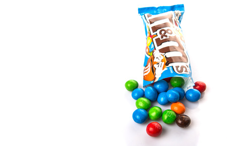 KUALA LUMPUR, MALAYSIA - JANUARY 23RD, 2015. MM are colorful button shape candies produced by Mars Incorporated, introduced in 1941 and currently being sold in as many as 100 countries worldwide.のeditorial素材