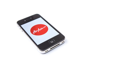KUALA LUMPUR, MALAYSIA, JANUARY 25TH 2015. Air Asia mobile apps. AirAsia is a Malaysian low-cost...