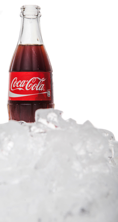 KUALA LUMPUR, MALAYSIA - FEBRUARY 5TH, 2015. A bottle of Coca Cola soft drinks. Coca Cola drinks are produced and manufactured by The Coca-Cola Company, an American multinational beverage corporationのeditorial素材