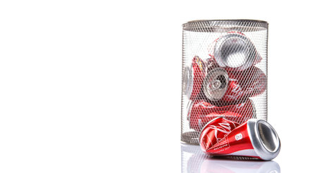 KUALA LUMPUR, MALAYSIA - FEBRUARY 6TH 2015. Recycling Coca Cola cans. Coca Cola drinks are produced...