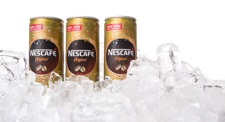 KUALA LUMPUR, MALAYSIA - FEBRUARY 13TH 2015. Nescafe can drink. Nescafe is a brand of instant coffee made by Nestle, a Swiss multinational food and beverage company, first introduced on April 1, 1938.のeditorial素材