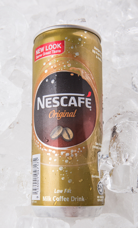 KUALA LUMPUR, MALAYSIA - FEBRUARY 13TH 2015. Nescafe can drink. Nescafe is a brand of instant coffee made by Nestle, a Swiss multinational food and beverage company, first introduced on April 1, 1938.のeditorial素材