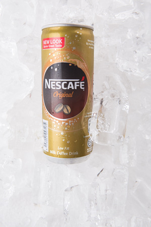 KUALA LUMPUR, MALAYSIA - FEBRUARY 13TH 2015. Nescafe can drink. Nescafe is a brand of instant coffee made by Nestle, a Swiss multinational food and beverage company, first introduced on April 1, 1938.のeditorial素材