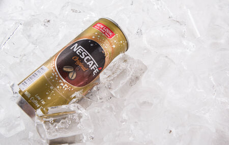 KUALA LUMPUR, MALAYSIA - FEBRUARY 13TH 2015. Nescafe can drink. Nescafe is a brand of instant coffee made by Nestle, a Swiss multinational food and beverage company, first introduced on April 1, 1938.のeditorial素材