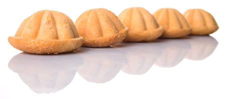 Kuih bahulu, Malay sweet egg sponge muffin cake on white backgroundの写真素材