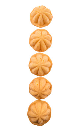 Kuih bahulu, Malay sweet egg sponge muffin cake on white backgroundの写真素材