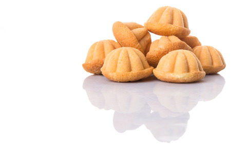 Kuih bahulu, Malay sweet egg sponge muffin cake on white backgroundの写真素材