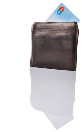 KUALA LUMPUR, MALAYSIA - FEBRUARY 19Th 2015. Maestro debit card in old wallet. Maestro is a multi-national debit card service owned by MasterCard Incorporated that was founded in 1992.のeditorial素材