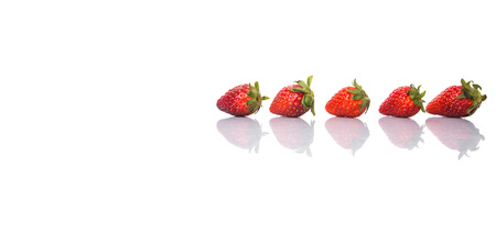 Strawberries over white backgroundの写真素材