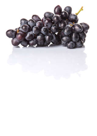 Black grapes over white backgroundの写真素材