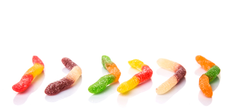 Colorful sugar jelly candy strip over white backgroundの写真素材