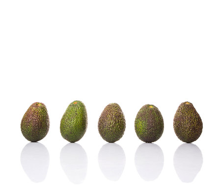 Avocado fruit over white backgroundの写真素材