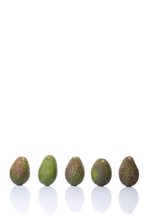 Avocado fruit over white backgroundの写真素材