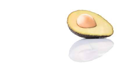 Avocado fruit over white backgroundの写真素材