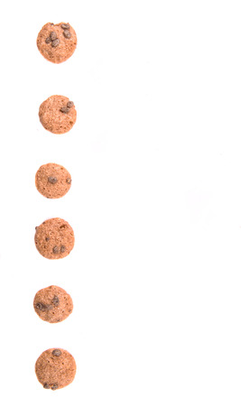 Chocolate flavored breakfast cereal over white backgroundの写真素材