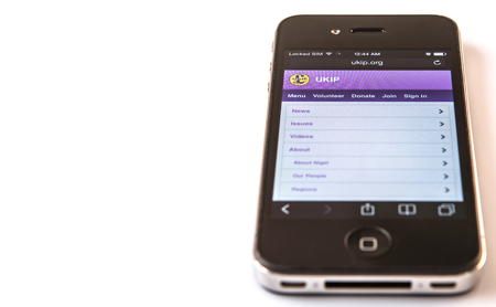 KUALA LUMPUR, MALAYSIA - MARCH 2ND 2015. UKIP website on Iphone. Founded in 1993, The UK Independence Party, commonly known as UKIP is a right-wing political party in the United Kingdom.のeditorial素材