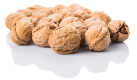 Walnuts over white backgroundの写真素材