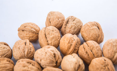 Walnuts over white background