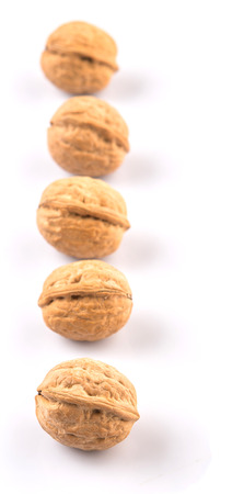 Walnuts over white backgroundの写真素材