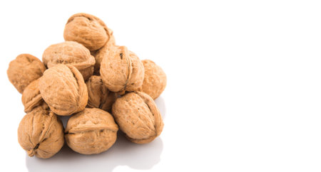 Walnut nuts over white background