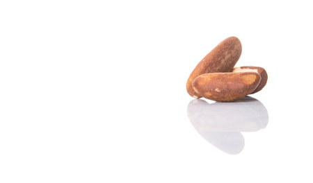 Brazil nuts over white background